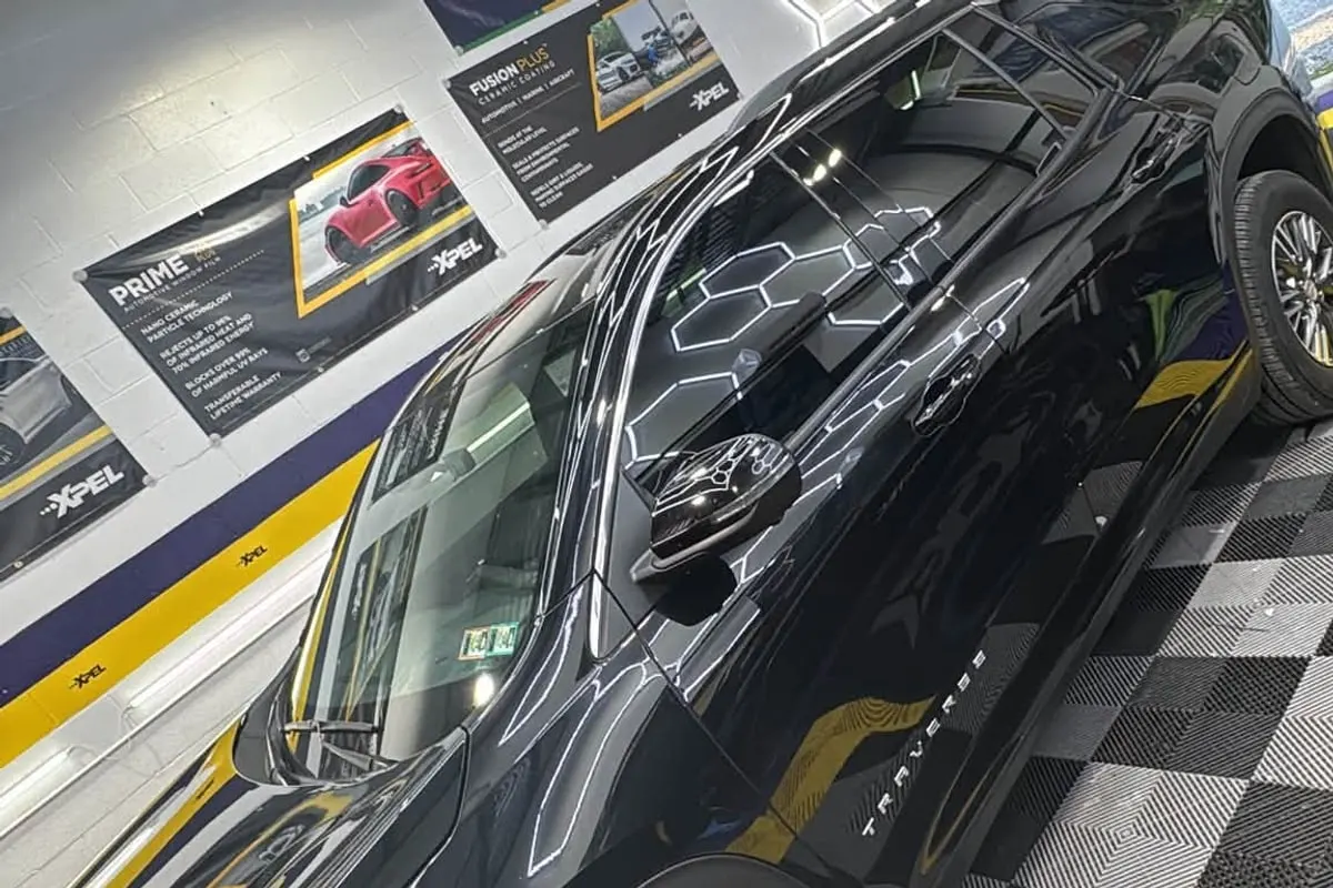 A black Hyundai SUV with tinted glass at Mr. Tint