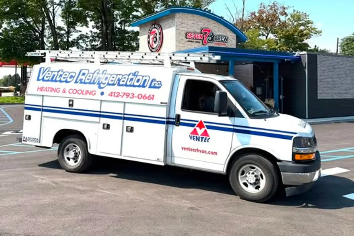 A white Ventec Refrigeration box van wrapped with company lettering by Mr. Tint