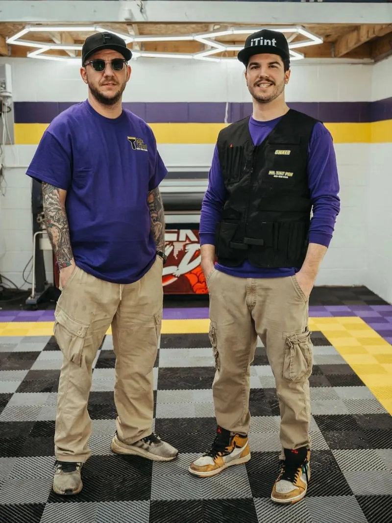 Eric Lovas, owner of Mr. Tint, on the right, with a member of the team on the shop floor in Plum, Pennsylvania