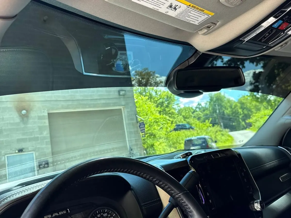 The view forward from the driver seat through a freshly tinted windscreen