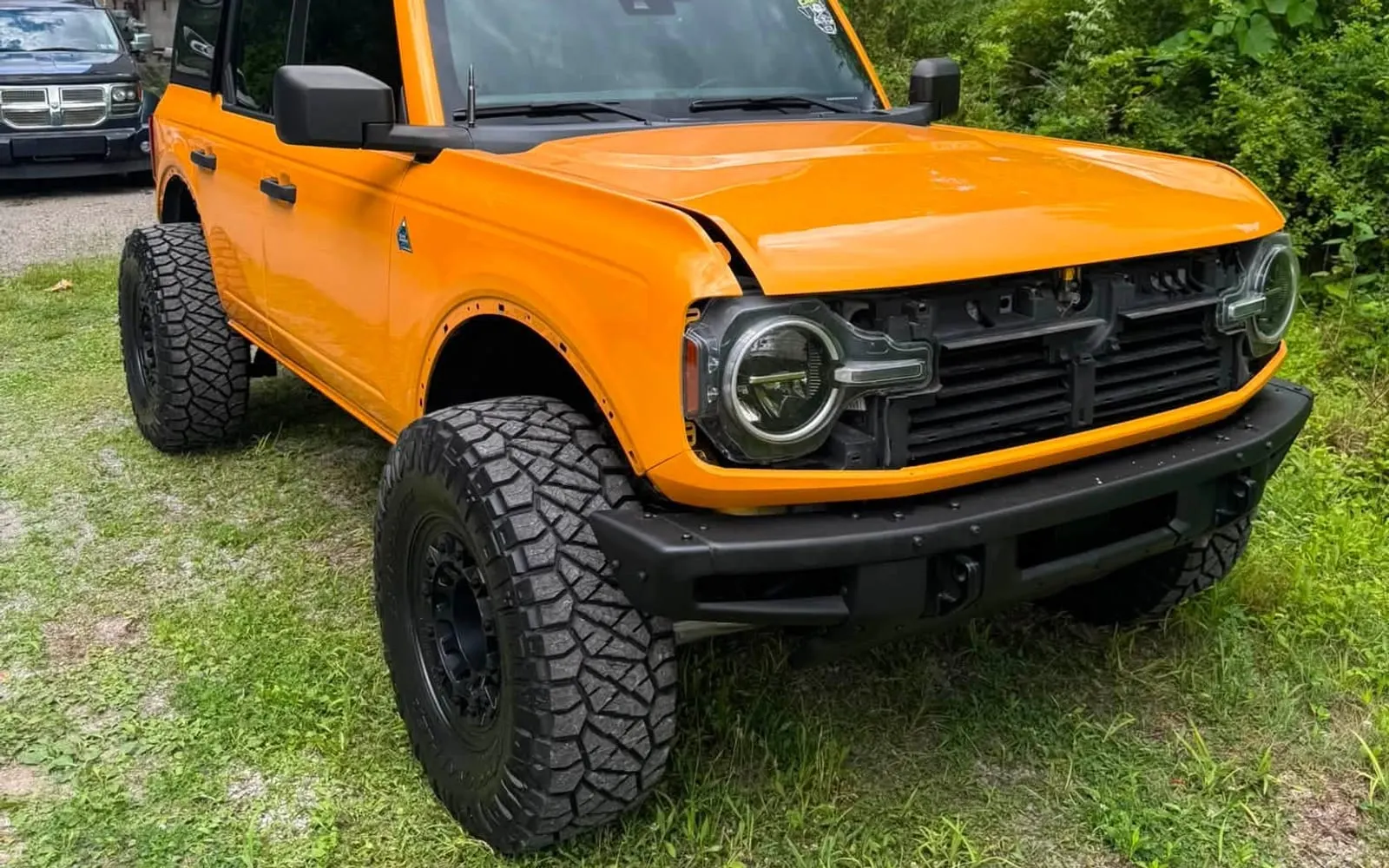 A Ford Bronco finished in an orange colour-change wrap by Mr. Tint